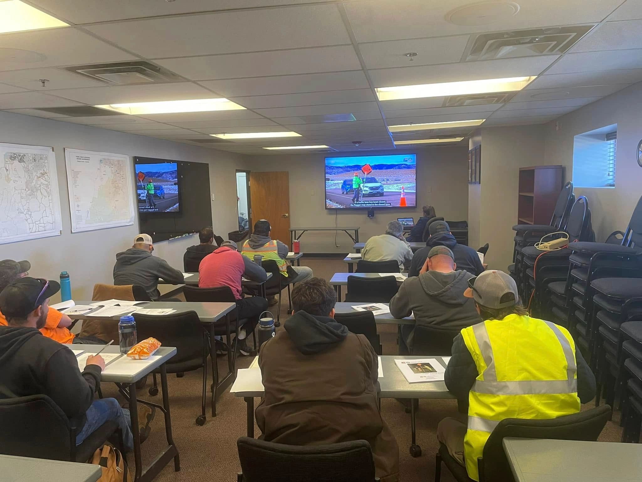 Adults in a workforce safety training classroom